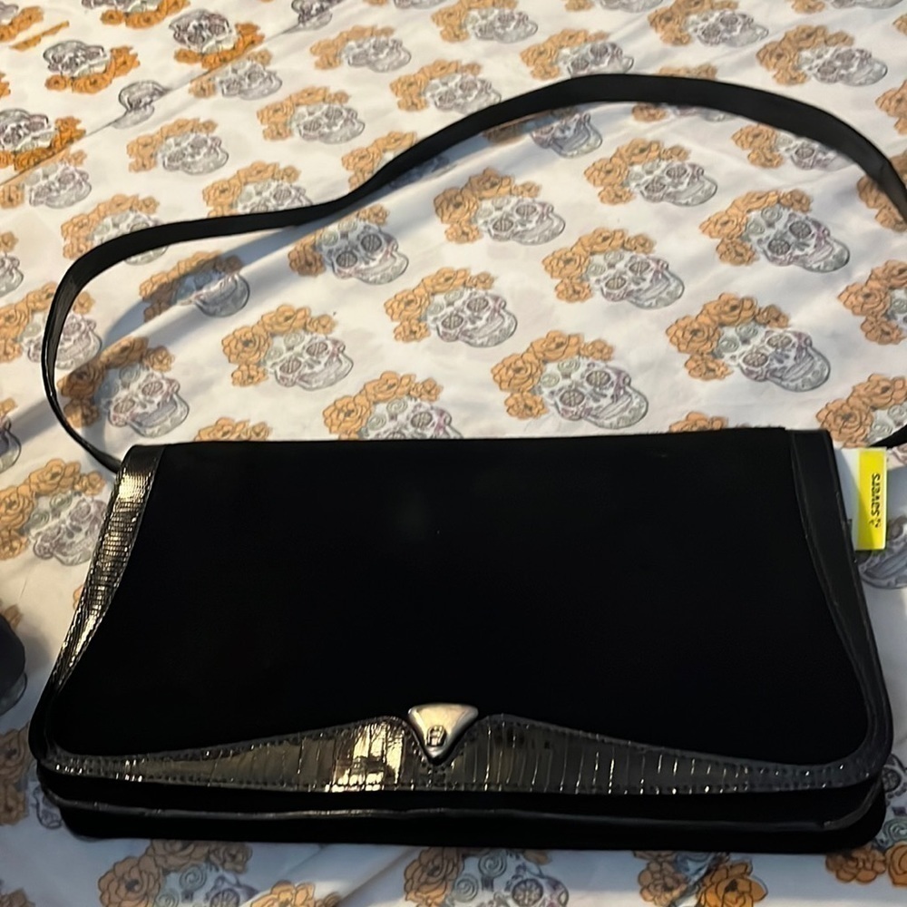 Etienne Aigner suede and leather shoulder with a flap front.  Good condition